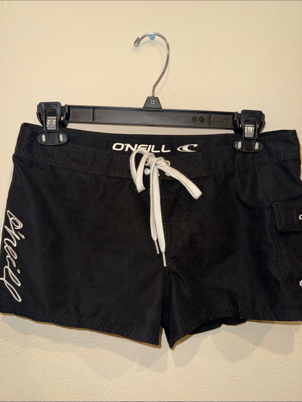 NWT O’Neill cover up board shorts size 5
